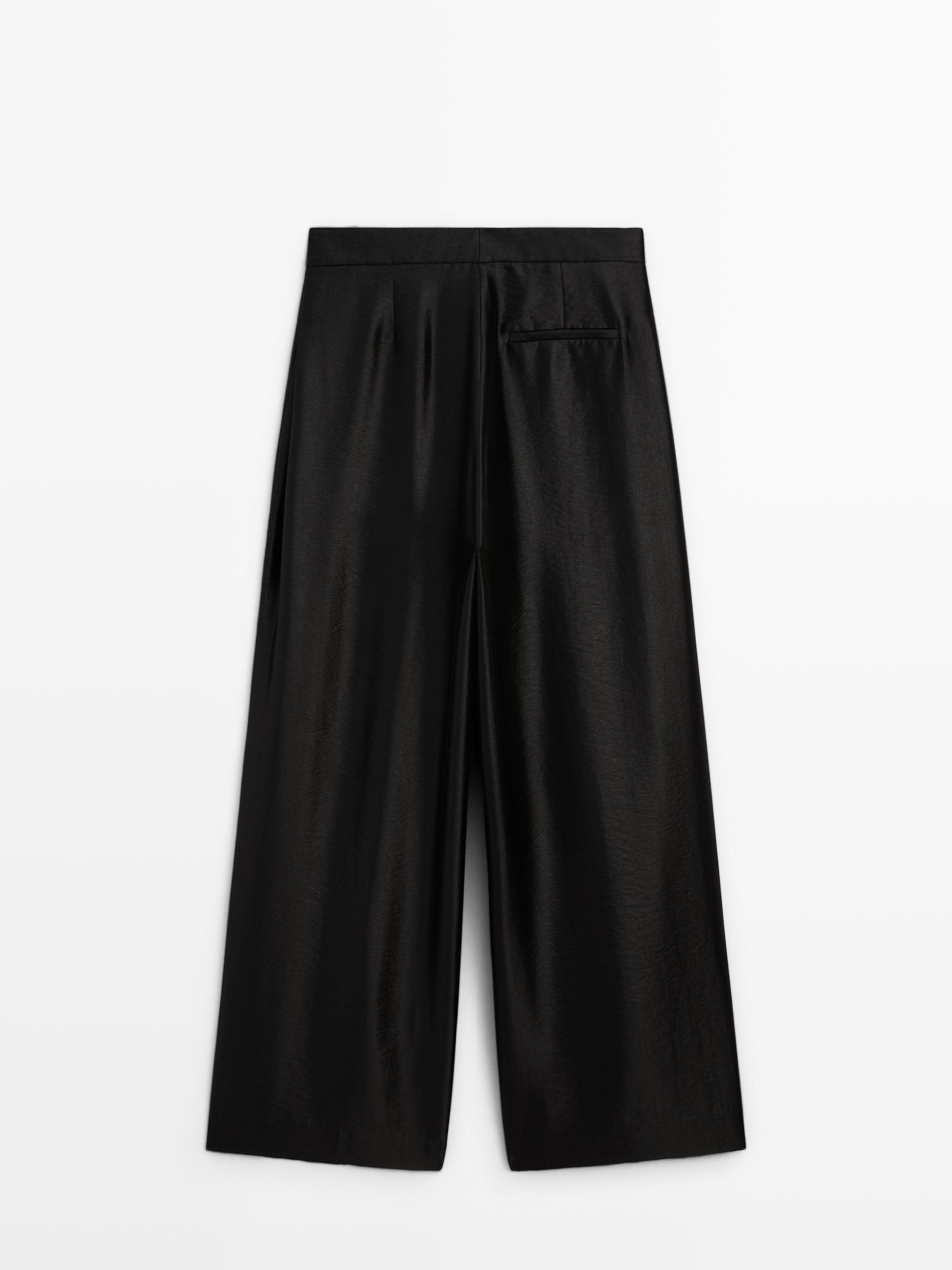Wide-leg voluminous trousers with darts